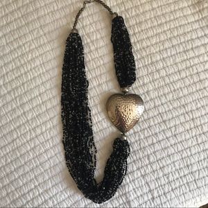 Beaded statement necklace with silver heart